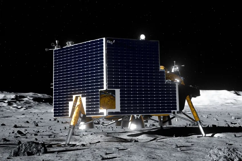 A spacecraft with solar panels sits on the rocky, grey surface of the Moon against a backdrop of space.