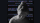 A grayscale marble statue of a woman's head and shoulders is depicted against a black background, overlaid with colorful glitch-like text fragments.