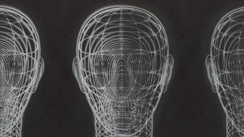 Three wireframe human heads are depicted against a dark background, their complex overlapping patterns evocative of the Johari window model, revealing multifaceted layers within each head's structure.