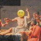 Classical painting with figures gathered around a central person, now replaced by a smiling emoji face, gesturing upwards. This playful twist adds a modern touch, as one figure offers a cup amidst the vibrant emojis.