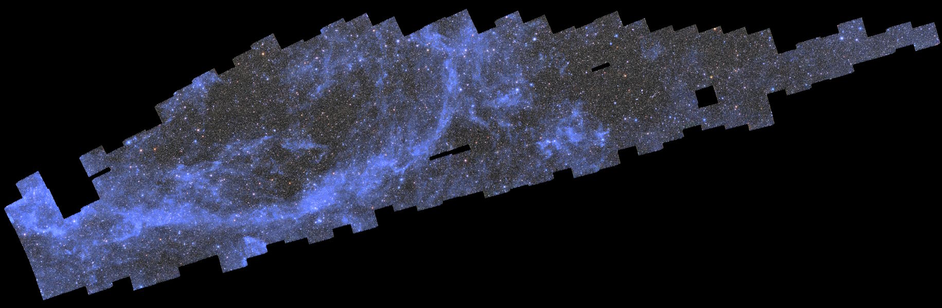 A mosaic image of a distant spiral galaxy, part of the Euclid Mission's cosmic story, showcases its bright blue and dark regions against a black background.