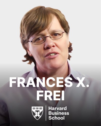 A person with short hair and glasses is shown in a professional photo with the text "Frances X. Frei, Harvard Business School" at the bottom.