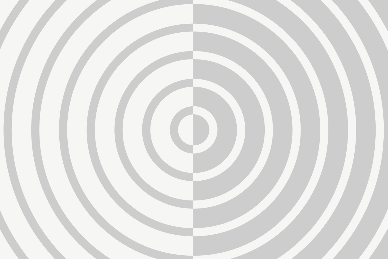 Concentric circles create an optical illusion with alternating light and dark gray lines on a white background.