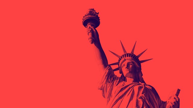 A stylized image of the Statue of Liberty with a red overlay subtly symbolizes resilience and freedom, evoking thoughts on life expectancy.