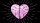 A pink brain shaped like a heart with rays emanating from it against a black background.