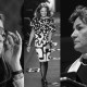 A black and white collage of three women: one adjusting sunglasses, one walking on a runway, and one in a scarf, all captured in different settings. Each embodies the essence of women redefining leadership through their unique styles and confident presence.