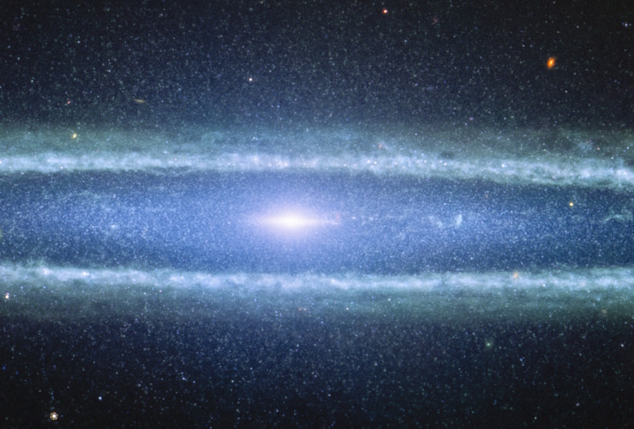 A detailed view of the spiral galaxy, reminiscent of JWST's stunning imagery, reveals a bright core surrounded by luminous arms, akin to the grand design of the Sombrero Galaxy, set against a backdrop of numerous stars.