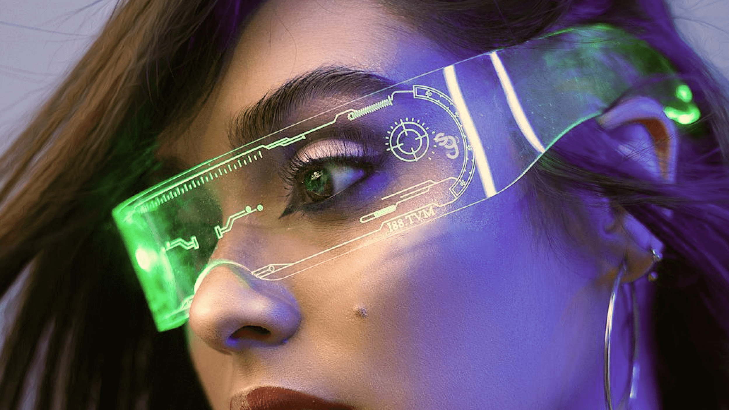 A person wearing futuristic, translucent smart glasses with green lights and a digital interface display.