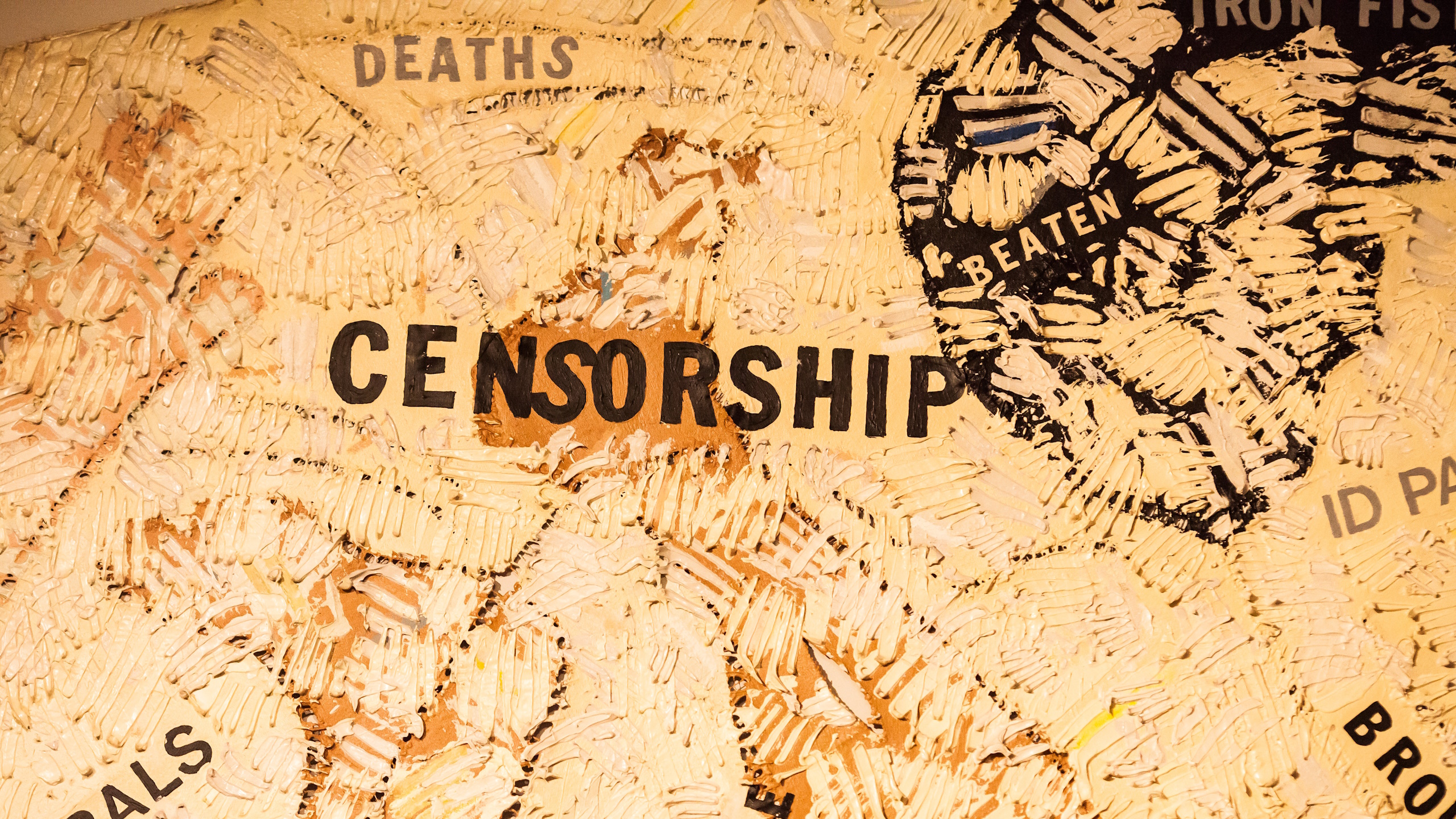 A textured, abstract artwork prominently features the word "CENSORSHIP" in bold black, flanked by stark words like "BEATEN," "DEATHS," and "IRON FIST." The beige backdrop subtly hints at government influence, blending shadows of science with restraint.