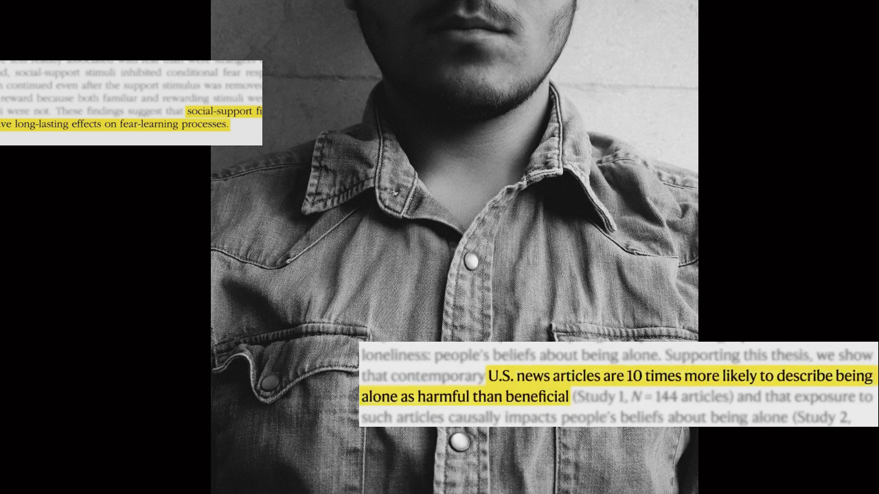 A person in a denim shirt is shown from the shoulders up. Highlighted text overlays mention that U.S. news often portrays being alone as more harmful than beneficial.