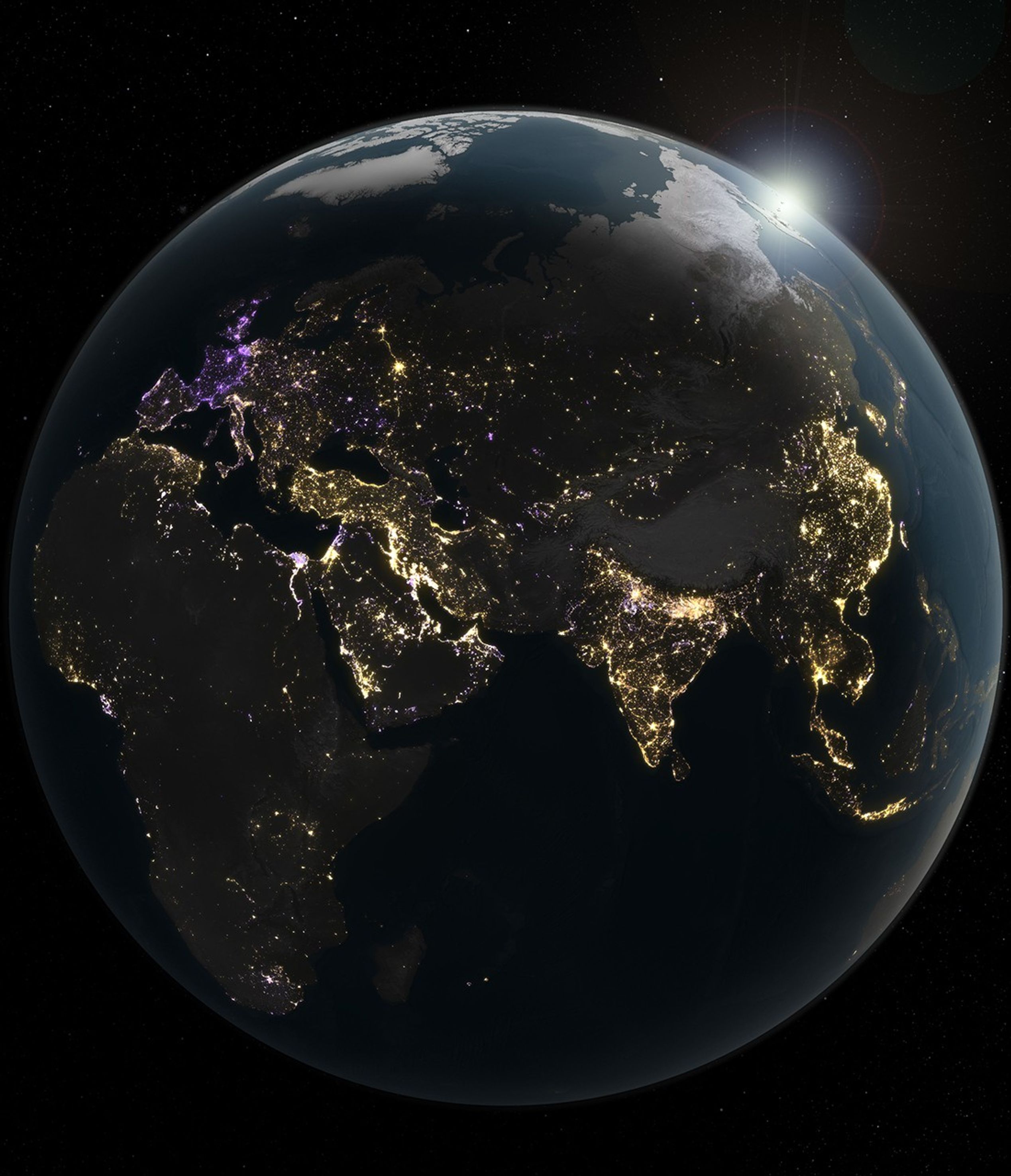 A view of Earth from space showing Asia, Europe, and Africa at night, with city lights visible and the sun rising over the northeastern horizon.